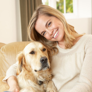 Woman with her golden retreiver