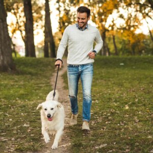 man walking pretty dog